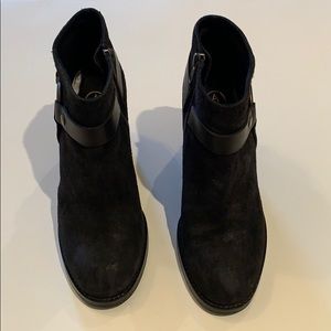 Black suede booties with side buckles